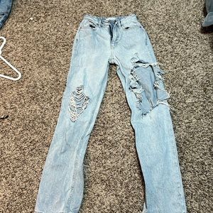 ripped blue jeans size 23